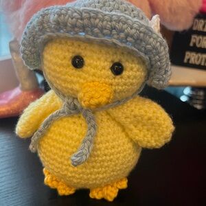 Handcrafted spring chickadee with blu flower bonnet crochet